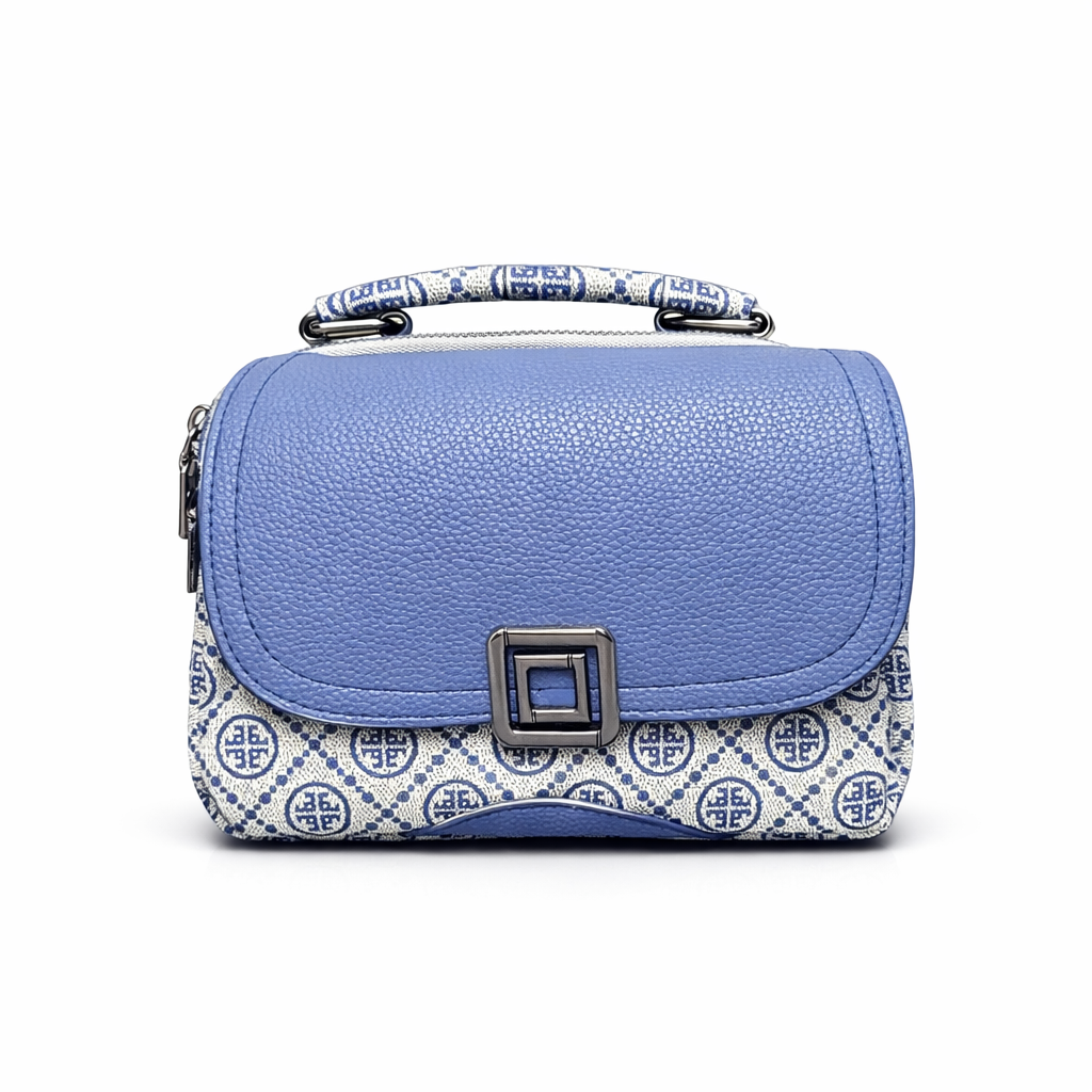 Blue handbag with patterned base and handle on a white background
