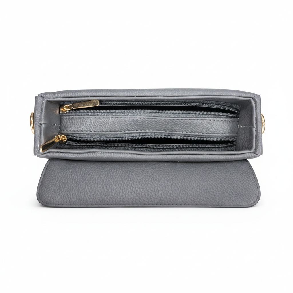 Gray handbag with gold accents on a white background